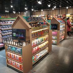 the inside of a grocery store filled with lots of food and drink items on display