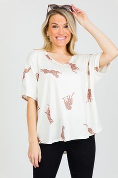 O M G! This tee is all the best things! If the chic leopard print and easy relaxed fit aren't enough to win you over, the super soft and stretchy knit material is sure to please. Grab yours today! Chic Printed Tops For Loungewear, Trendy Leopard Print V-neck Top, Printed Tops For Loungewear In Fall, Printed Tops For Fall Loungewear, Trendy Printed Loungewear Tops, Trendy Printed Tops For Loungewear, Oversized Leopard Print Top, Casual Leopard Print Tops For Day Out, Relaxed Fit Leopard Print Top For Summer