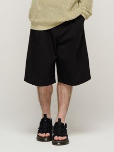 This is a trendy and unique pants by CARGOBROS that is made out of high quality and sturdy material. With distinctive mood of the design and comfortable wear, you can style it for your casual daily outfit.- Single tuck detail with relaxed fit- Sturdy cotton 100% fabric- Trendy and casual mood Casual Pants With Built-in Shorts For Fall, Baggy Black Bottoms With Built-in Shorts, Trendy Baggy Black Shorts, Casual Black Tapered Leg Bottoms, Black Relaxed Fit Pants For Spring, Modern Fall Streetwear Bottoms, Modern Black Bottoms For Workwear, Oversized Casual Shorts With Elastic Waistband, Baggy Black Cotton Shorts