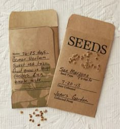 two seed packets sitting on top of a table