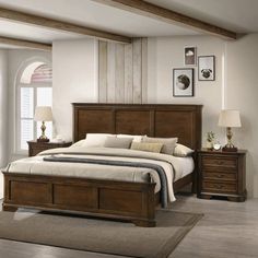 a bedroom scene with focus on the bed and dressers