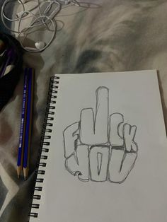 a drawing of a hand with the word love written on it and two pencils next to it