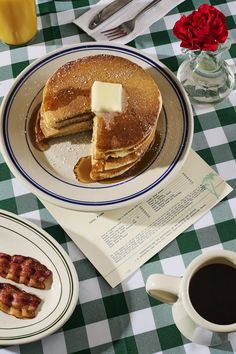 pancakes with syrup and butter on a table