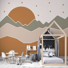 a child's bedroom with mountains painted on the wall