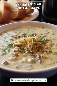 a bowl of chowder soup with bread in the background and text overlay that reads bar harbor clam chowder recipe