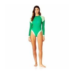 Add a bright pop of color to your beach day in our Long Raglan Sleeve One Piece. This sleek one piece swimsuit comes with removable cups and long sleeves for added protection and coverage. The copper-infused fabric provides anti-bacterial and anti-odor benefits as well as UPF 50+ protective features so you can spend all day in the sun and still feel fresh. You'll be ready for a summer of surf and sand with this swimsuit! Green Long Sleeve Swimwear For Poolside, Green Rash Guard For Swimming, Beach Season, Green Rash Guard For Poolside And Beach Season, Green Long Sleeve Swimwear For Beach, Fitted Green Rash Guard, Green Long Sleeve Beachwear Swimwear, Fitted Long Sleeve Green Swimwear, Green Surfing Bodysuit For Beachwear, Green Fitted Rash Guard For Beach Season