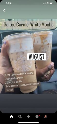 two cups of iced coffee sitting on top of a car dashboard with the caption, salted caramel white mocha