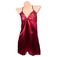 This mini-dress is sleeveless and V-neck. The pattern is solid, the material is nylon and the fit is true to size. Description: Color: Black/Red/Green Material: Nylon Red V-neck Slip Dress For Sleep, Red Sleeveless Satin Nightgown, Red Spaghetti Straps Camisole For Sleep, Red V-neck Nightwear Slip Dress, Red Spaghetti Straps Nightgown For Wedding Night, Red V-neck Camisole For Sleep, Sleeveless Chemise For Night Out, Red Camisole Sleep Dress, Red Sleeveless Nightgown