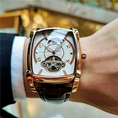 Gender:Men; What's in the box:1 x Gift Box,1 x Watch; Shape:Semi-Rectangular Bag; Type:Mechanical Watch; Movement Type:Automatic Self-winding; Case Material:Alloy; Band Material:Leather; Features:Wristwatch,Fashion,Business,Creative; Listing Date:11/22/2023; Production mode:Self-produce; Case Diameter Approx:4cm / 1.57 Inches; Case Thickness Approx:1.2cm / 0.47 Inches; Band Length Approx:26cm / 10.24 Inches; Band Width Approx:2.4cm / 0.94 Inches; Model:1931; Functions:Waterproof,Luminous,Automat Rectangular Automatic Watch As Gift, Rectangular Skeleton Dial Watch For Gift, Rectangular Skeleton Dial Watch As A Gift, Rectangular Rose Gold Watch Accessories For Business, Rectangular Watches With Subdials As Gift, Rectangular Skeleton Dial Watch As Gift, Formal Rectangular Watch With Skeleton Dial, Formal Rectangular Skeleton Dial Watch, Automatic Watch With Rectangular Dial For Gift