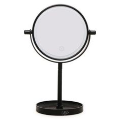 the light-up vanity mirror is so glamorous & useful! this adjustable round mirror on a stand has an LED ring light, so it's perfect for putting on makeup. use this makeup mirror anywhere; it's cordless! features built-in storage tray on the base, 180-degree swivel, bright LED light battery-operated with smart touch on/off size: 12.5in (H) x 8.4in (W) req's 4 x aaa batteries (not included) Light Up Vanity, Makeup Vanity Mirror, Black Vanity, Led Ring Light, Led Ring, Five Below, Bright Led Lights, Storage Tray, Ring Light