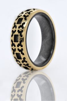 Worried about what size to order? Use this free app (click here for iOS and here for Google devices) to instantly find your size. And if the fit isn't perfect, we'll be happy to exchange it. This is a 6.5mm wide Square Pattern Fractal Band cast in 14K Gold with a Forged Carbon Fiber liner produced by Carbon6. These are custom made, please allow two weeks for delivery. Modern 14k Stamped Jewelry For Promise, Luxury Hallmarked Black Engraved Ring, Ring Carbon, Carbon Fiber Rings For Men, Mens Wedding Bands Carbon Fiber, Carbon Fiber Ring, Square Pattern, Gold And Silver, Carbon Fiber