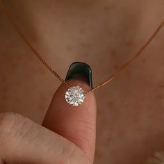 Classic & minimal solitaire necklace made in 14k rose gold and set with moissanite or lab grown diamond to your selection. ● The pictures show the necklace set with 0.9ct / approx 6mm center stone, you can choose between lab grown diamond or moissanite for the center stone. ● Available also in 18k gold, contact us to order. ● More sizes are available for the stone, contact us to inquire. In this listing, you can see the necklace in ROSE GOLD. You can see & order the different colors from the fol Round Diamond Solitaire Necklace, Minimal Diamond Necklace, Solitaire Pendant Design, Diamond Pendants Designs Unique, Single Diamond Pendant, Round Diamond Necklace, Gold Diamond Pendant Necklace, Solitaire Diamond Necklace, Diamond Necklace Simple