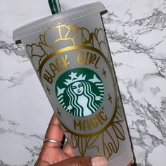 Black Girl Magic Starbucks Tumbler in gold with ability to personalize with a name and/or request another color! This listing is for one Starbucks cold cup Includes lid and straw 24 oz (venti) tumbler Reusable BPA Free Cups are decorated with premium quality permanent vinyl The vinyl is placed by hand which means not every cup will be lined up exactly the same Cups are NOT sealed with epoxy  CARE INSTRUCTIONS: -Not microwave safe -Not dishwasher safe -Hand wash ONLY -Do NOT soak -Do not scrub de Starbucks Tumbler, Starbucks Hot, Cold Cup, Permanent Vinyl, Bpa Free, Care Instructions, Dishwasher Safe, How To Find Out, Straw