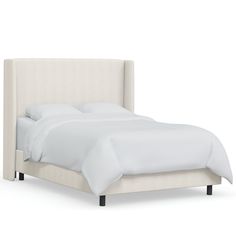 a bed with white linens and pillows on it's headboard, against a white background