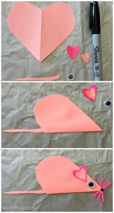 the paper mouse is cut out to make it look like they are ready for valentine's day