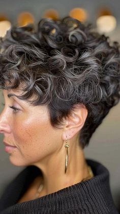 Charm Redefined: 22 Short & Curly Hairstyles for Older Women Gray Curly Pixie Haircut, Short Curly Salt And Pepper Hair, Short Curly Highlighted Hair, Pixie Permed Hair, Curly Wedge Haircut, Permed Pixie Hairstyles, Curly Undercut Women, Short Pixie Cut Curly Hair, Pixie For Curly Hair