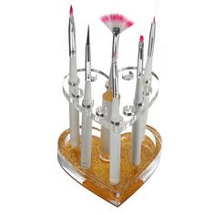 PRICES MAY VARY. Brushes, eyebrow Mirachia pencil pen stand. 12 hole heart-shaped Mirachia dressing table decoration. Material: plastic. Package include: 1x nail art brush pen stand. Package include: 1x nail art brush pen stand ( which can gold 12pcs pen/brush ). 
Weight: about 104 g 
Condition: new 
Style: Heart shaped 
Material: plastic 
High quality brush holder. Heart shape with gold glittery bottom. 
Perfect for professional or Mirachiapersonal use. 
Brushes are for illustrative purposes on Nail Polish Brush, Nail Pen, Acrylic Nail Brush, Makeup Brush Organization, Cosmetic Display, Stand Display, Nail Art Pen, Nail Brush, Gold Makeup