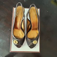 Coach Dress Shoes With Heel Color Brown And Gold Trim Brand New Never Worn Coach Almond Toe Heels For Party, Coach Brown Heels For Formal Occasions, Coach Wedge Heels For Formal Occasions, Formal Coach Brown Heels, Coach Dress, Shoes With Heels, Coach Shoes, Gold Trim, Brown Gold