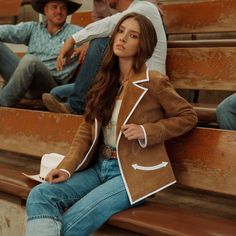 For preordered items: Good things come to those who wait. All preordered sizes will ship in the Fall 2023 (Sept/Oct). Get on your high horse with a dreamy jacket fit for a rodeo queen. Make a statement in the boardroom or belly up to the bar – our Rodeo Ready Blazer is ready for anything. Crafted in luscious caramel suede accented with premium white leather details, it’s western wear elevated, and the perfect way to add a little cowgirl charm to your closet. Wear it with jeans, boots, and a hat, Fitted Casual Outerwear With Contrast Stitching, Fitted Western Style Outerwear For Spring, Fitted Western Outerwear For Spring, Fitted Western Style Spring Outerwear, Fitted Western Spring Outerwear, Fitted Brown Western Outerwear, Fitted Western Brown Outerwear, Fitted Outerwear With Contrast Stitching For Work, Fitted Denim Outerwear With Contrast Stitching For Work