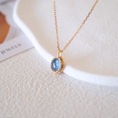 This minimalist oval Aquamarine necklace is a timeless piece of jewelry. Aquamarine is the birthstone for the month of March. It's a beautiful gemstone with a calming blue color reminiscent of the ocean, often symbolizing tranquility, courage, and clarity. With its understated design and vintage style, this necklace serves as a perfect gift for her, encapsulating both classic charm and the soothing allure of Aquamarine. Its simplicity ensures versatility, allowing it to complement any outfit or occasion, making it an ideal addition to any jewelry collection. DETAILED DESCRIPTION// NECKLACE: Length: 40+3cm Stone size: 8mm *9mm  Material: 14k gold filled s925 sterling silver with blue aquamarine  (Please take note that aquamarine is a some transparent stone that exhibits varying shades of re Aquamarine Necklace Pendant, Jewelry Aquamarine, Necklace Blue Stone, Blue Stone Necklace, Aquamarine Pendant, Aquamarine Necklace, Necklace Blue, Aquamarine Blue, Perfect Gift For Her