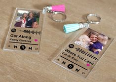 two clear key chains with pictures on them