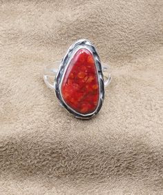 "Beautiful Sponge Coral Ring US Size 10. Can be re-sized for no additional charge  Top 25 mm x 17 mm; 1\" x 5/8\" Weight 6.2 grams Sterling silver 925, Handmade $70 Exclusively designed by Richard James for richlo jewelry Check out our other fine jewelry at  https://www.etsy.com/shop/arizonagemstudio Coral is highly-prized as a substance believed to be endowed with mysterious sacred properties. It is a symbol of modesty, wisdom, happiness and immortality." Unique Ruby Ring In Sterling Silver, Unique Ruby Ring In Sterling Silver Stamped 925, Artisan Red Sterling Silver Rings, Untreated Red Sterling Silver Jewelry, Unique Ruby Ring With Polished Sterling Silver, Unique Untreated Red Jewelry, Spiritual Red Sterling Silver Ring, Coral Rings For Women, Luxury Coral Gemstone Ring