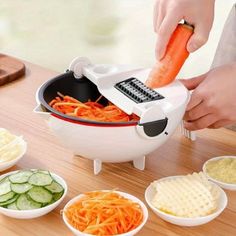 a person using a vegetable slicer to cut carrots