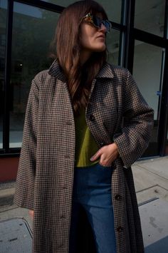 Oversized herringbone plaid coat has wide sleeves and buttons down front with side seam pockets and removable belt. fully lined.    100% wool outside / 100% rayon lining    measurements (laying flat):  xs / s   - chest: 22" shoulder to shoulder: 17" sleeve length: 22"  length (front) 45"  m / l   - chest: 23.5" shoulder to shoulder: 19" sleeve length: 22.5"  length (front): 46"    made with love in a fair trade certified™ facility in china.