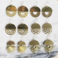 These brass earrings are surprisingly lightweight and hang beautifully. Cheap Brass Dangle Jewelry, Everyday Bronze Brass Earrings, Everyday Gold Brass Plug Earrings, Matte Gold Brass Earrings, Bronze Brass Earrings With Ear Wire, Single Brass Dangle Earring, Everyday Brass Plug Earrings, Gold Bohemian Earrings For Everyday, Bronze Earrings With Ear Wire For Everyday