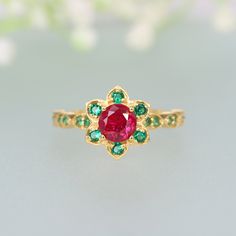 Garnet and Emerald Floral Engagement Ring January Birthstone 14K Gold Wedding Ring Multi Gemstone Cluster Ring For Women's Gift For Her Ring Description:- Main Stone- Garnet Cut of Stones - Faceted  Stone size - 5mm Stone Color- Red Stone Shape - Round Creation- Lab Created Birthstone - January Secondary Stone - Emerald ( Lab Created ) Stone Shape - Round  Stone Color - Green Stone Grade - AAA+ Check out my other items!   PAYMENTS   We accept PayPal, If we do not receive payments immediately we will hold the item only for one working day for your payments and we will be re-listing the item afterward. if there is a difficulty in paying for the item/s you have bought immediately please contact us so we can hold your item. FEEDBACK Please contact us if you have any problem with the product be May Birthstone Cluster Ring With Halo Design For Wedding, Heirloom Emerald Ring With Halo Design For Wedding, Wedding Ruby Ring In Yellow Gold With Accent Stones, Wedding Yellow Gold Ruby Ring With Accent Stones, Gold Multi-stone Emerald Wedding Ring, Gold Multi-stone Emerald Ring For Weddings, 14k Gold Ruby Ring With Accent Stones For Wedding, Wedding Ruby Ring With Accent Stones In 14k Gold, 14k Gold Emerald Ring With Halo Design For Wedding