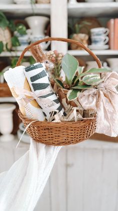 a wicker basket filled with decorative items