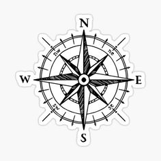 a black and white compass with the letter s in it's center, on a white background