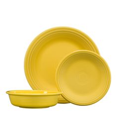 yellow dinnerware set on white background