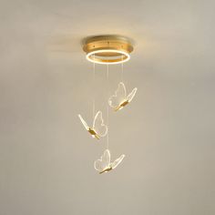 Introducing the mesmerizing Nicole - Gold Butterfly Spiral Stairs Ceiling Lighting: Acrylic LED Pendant. This remarkable piece is a true work of art that will illuminate your space with elegance and sophistication. Crafted with exquisite attention to detail, this pendant features a stunning spiral staircase design adorned with delicate gold butterfly accents. The acrylic construction adds a touch of modernity, while the LED technology ensures energy efficiency and a long-lasting glow. Perfect for adding a dramatic focal point to any room, whether it be your living room, dining area, or bedroom. The Nicole pendant exudes a sense of charm and grace that will leave your guests in awe. Elevate your interior decor with this breathtaking lighting fixture.Size: 10 to 14 Inch 15 to 19 Inch 20 to 2 Spiral Stairs, Spiral Shape, Multi Light Pendant, Spiral Staircase, Energy Efficient Lighting, Cute Room Decor, Staircase Design, Ceiling Lighting, Modern Led