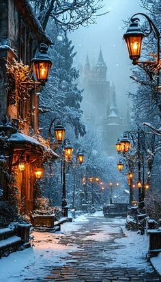 a snowy street lined with lamps and buildings