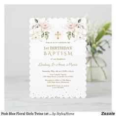 a wedding card with flowers on it and a vase full of flowers in the background