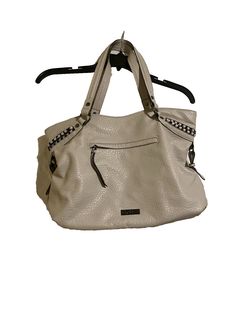 Elevate your casual look with this stunning Jessica Simpson satchel/top handle bag. The off-white faux leather exterior is accented with a silver, gray, and gunmetal hardware color. The bag features a zipper closure and a cream-colored top handle with a detachable shoulder strap. The bag measures 18 inches in width, 12 inches in height, and 5 inches in depth. It boasts plenty of features, including inner pockets, adjustable straps, and a lined interior with a beige nylon lining material. The bag is perfect for any casual occasion and is sure to add a touch of style to your outfit. White Hand Bag, Gunmetal Hardware, White Hand, In Depth, Handle Bag, Jessica Simpson, Hand Bag, Top Handle, Casual Looks