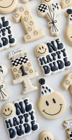 many decorated cookies are arranged on a table with the words happy bride spelled in black and white