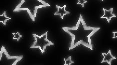 an array of white stars are shown on a black background in this image, it appears to be pixelated