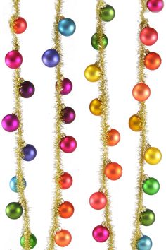 multicolored christmas ornaments hanging from a gold chain