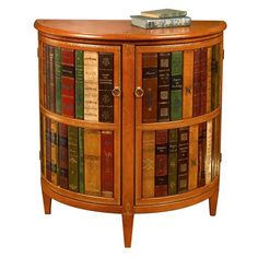 a wooden cabinet filled with lots of books