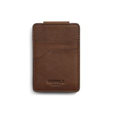 Our sturdy and reliable Magnetic Money Clip Wallet, designed to last years of use and built from our signature Navigator leather. Includes two leather-lined credit card slots and a leather-wrapped magnetic clip. Monogramming available for a personal touch. | Shinola Men's Magnetic Money Clip Card Wallet Classic Leather Card Holder With Coin Pocket, Classic Brown Card Holder With Rfid Blocking, Classic Bifold Card Holder For Everyday Use, Classic Bifold Wallet With Leather Patch, Brown Trifold Wallet With Rfid Blocking For Everyday Carry, Classic Leather Wallets With Card Slots, Classic Brown Wallets With Rfid Blocking, Classic Brown Wallet With Rfid Blocking, Brown Wallets With Rfid Blocking For Everyday Carry