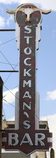 an old neon sign for a stockman's bar