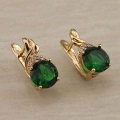 (eBay) Find many great new & used options and get the best deals for 2Ct Round Cut Simulated Emerald Stud Earring's 14K Yellow Gold Plated at the best online prices at eBay! Free shipping for many products! Gold Emerald Earrings, Emerald Fashion, Small Earrings Gold, Antique Gold Earrings, Emerald Earrings Studs, Gold Pendant Jewelry, Gold Ring Designs, Bangles Jewelry Designs, Halo Earrings Studs