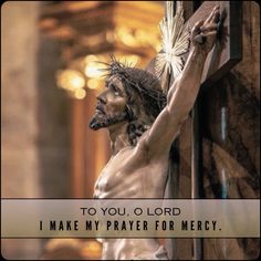 a statue of jesus with the words to you, o lord i make my prayer for mercy