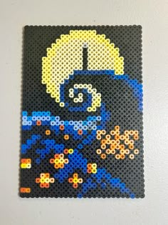 an image of a lego artwork made out of beads