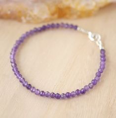 Wrap yourself in sparkle with this faceted Amethyst bracelet! Amethyst, the purple variety of Quartz, is said to encourage selflessness and spiritual wisdom, while improving motivation. It is a meditative gem that aids in providing a sense of calm, balance, and peace--who wouldn't want to tap into that goodness? Our bracelet is handmade in sterling silver or 14k gold filled with natural, micro-faceted Amethyst for extra sparkle! GEMSTONE: Natural Purple Amethyst STONE SIZE: 3mm (.1") SIZING: Ple Purple Faceted Amethyst Beaded Bracelets, Purple Amethyst Faceted Beaded Bracelets, Faceted Purple Amethyst Beaded Bracelets, Spiritual Purple Faceted Beaded Bracelets, Spiritual Faceted Purple Beaded Bracelets, Purple Faceted Spiritual Bracelets, Spiritual Purple Faceted Bracelets, Spiritual Faceted Purple Bracelets, Faceted Amethyst Crystal Bracelet For Healing