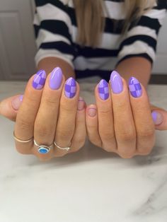 Simple Spring Nail Ideas Almond Shape, Fun Nail Designs Purple, Fun Nails Almond Shape, Nail Inspo Summer Purple, Pink And Purple Checkered Nails, Fun Almond Shaped Nails, Fun Nails Purple, Purple Gel Nails Designs, Purple Fun Nails