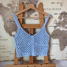 Measurements - Chest: Inches - Length: Inches - Sleeves: Inches Light Blue Fitted Knitted Tops, Knitted Light Blue Cotton Tops, Light Blue Knitted Cotton Tops, Blue Crochet Top For Vacation, Blue Knitted Crochet Top For Vacation, Blue Crochet Summer Crop Top, Blue Crochet Top For The Beach, Blue Knit Crochet Top, Blue Knitted Crochet Top