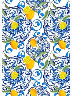 a blue and white tile with lemons on it